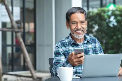 man calling to schedule a dental appointment at Hymas Family Dental